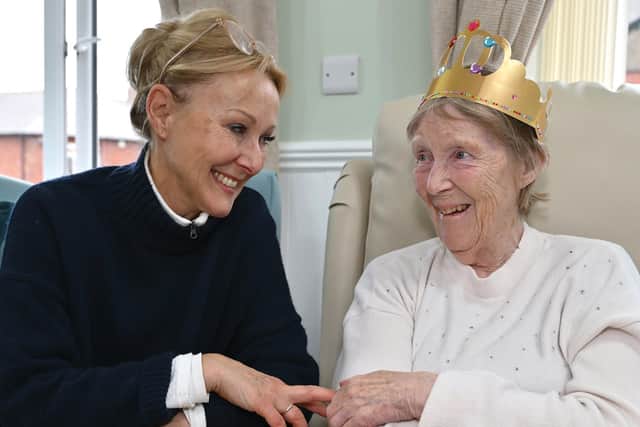 Jubilee House residents enjoy games at the celebration event.