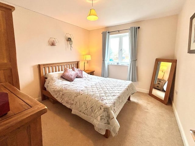 Another of the property's four bedrooms.