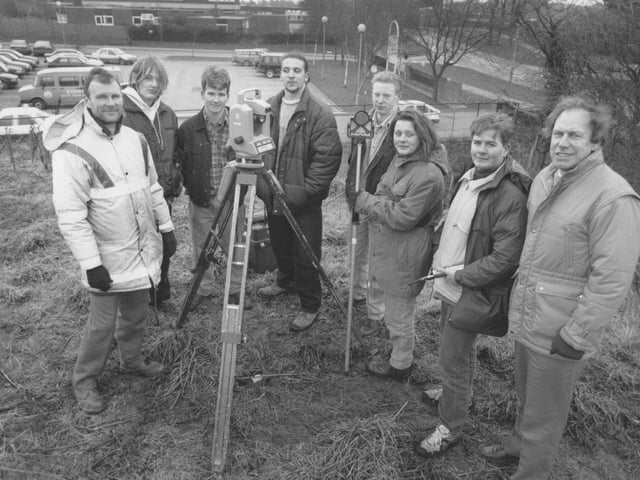 Scarborough Sixth Form College students are pictured with their teacher Terry Green, right, and NYCC Highways Department land surveyor Graham Goforth, left, plotting the site of the proposed new primary school between Graham School and the hospital in January 1993. The work is part of the students project to design the new building for their Design and Technology course.