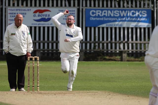 Bridlington 2nds in bowling action.