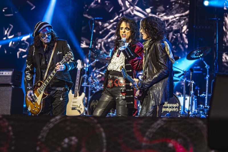 Hollywood star Johnny Depp, left, with rock legends Alice Cooper and Joe Perry.