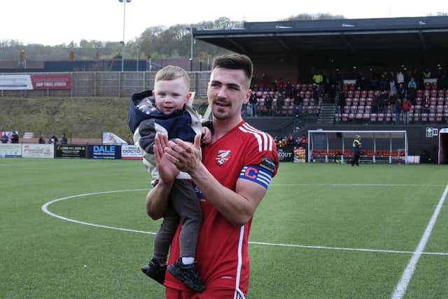 Boro skipper Will Thornton and his son thank the supporters for their backing this season.