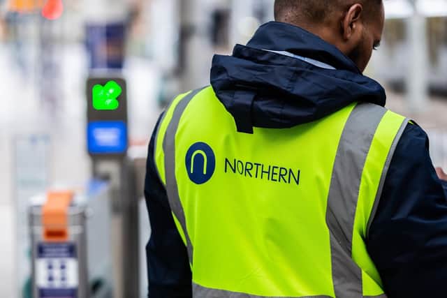Northern staff member at ticket gateline.
