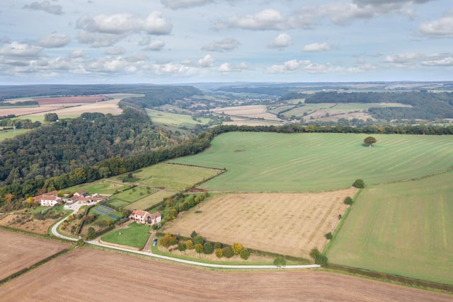 An aerial view of the property and its rural surroundings.