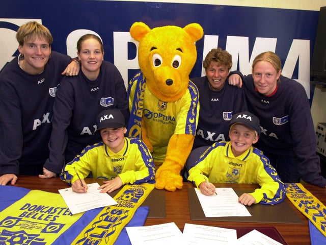 Two 11 year olds sign for the Doncaster Belles, they are, seated left Vikki Stevens, from Goole and Vicky Frisby, from East Markham, nr Retford. Watched by, from the left, Kaz Walker, Vicky Exley, Donny Bear, Gill Coultard and Leanne Hall.