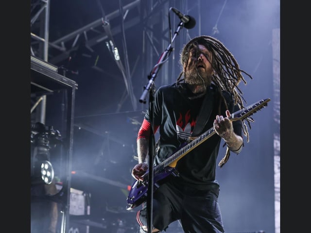 The whole band worked together like a well-oiled machine, creating an intense sound that could still be felt at the top of the tiered seating.