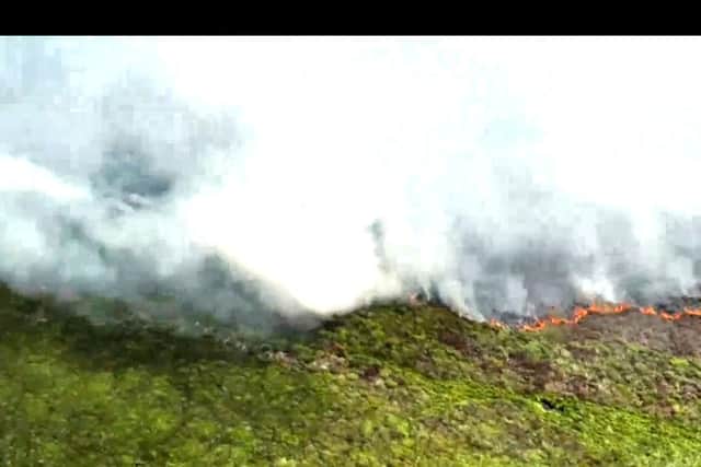 The fire continues to burn