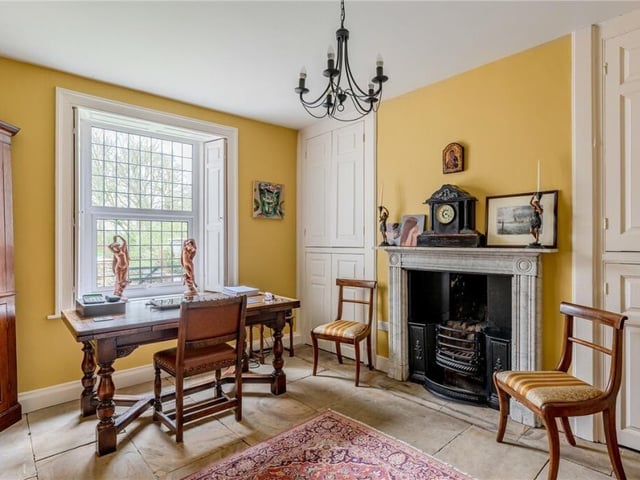 A study or home office, with built-in storage.