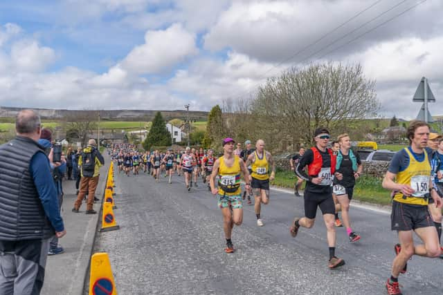 Scarborough Athletic Club’s Daniel Bateson, centre, hit PB form at the Yorkshire 3 Peaks Fell Race