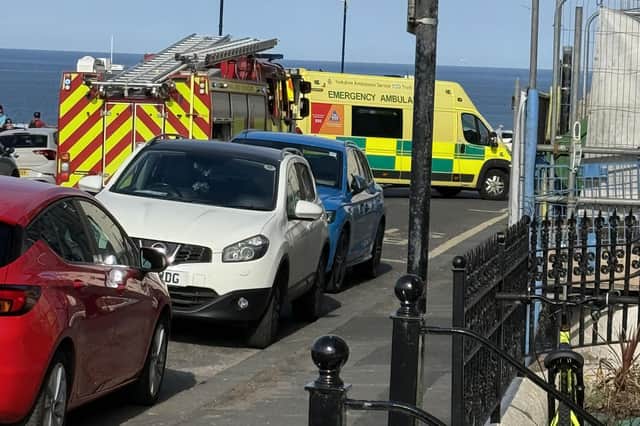 Emergency vehicles at the scene of an accident on Whitby West Cliff. picture: Paul Rudd.