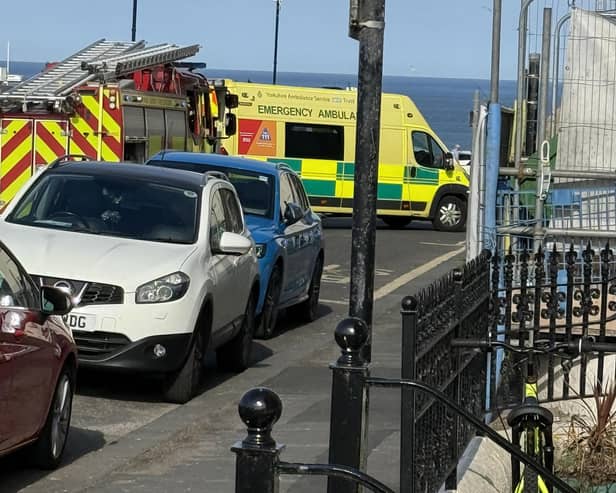 Emergency vehicles at the scene of an accident on Whitby West Cliff. picture: Paul Rudd.