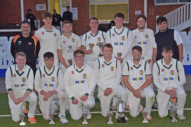 Flixton, pictured after their Hospital Cup final win, lost in the league game against Woodhouse Grange 2nds.