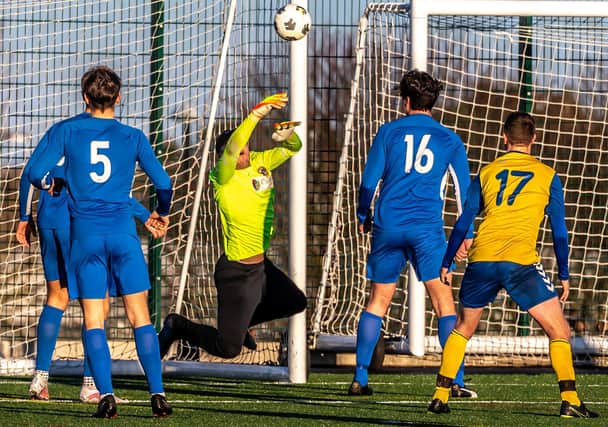 An excellent point-blank save by the Whitby Fishermen's goalkeeper