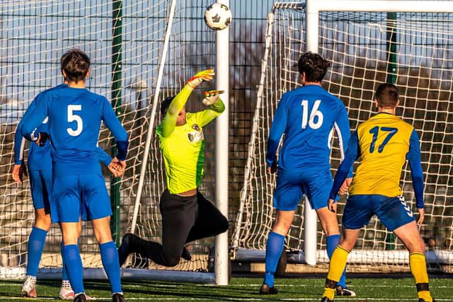An excellent point-blank save by the Whitby Fishermen's goalkeeper