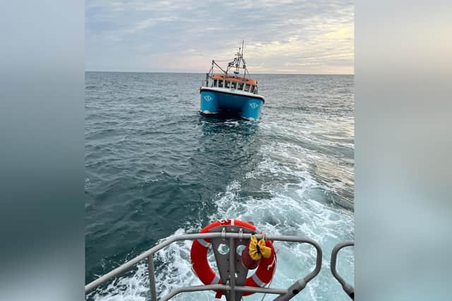 Whitby lifeboat tows the fishing vessel back to port after it got into difficulties off Staithes.