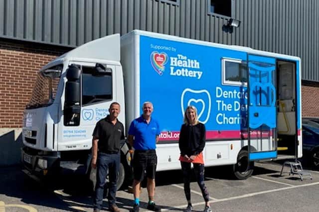 Unity Enterprise Manager Adrian Green (left), Dentaid Fleet Supervisor Richard Hill, and PAFRAS Director Karen Pearse, visiting the Dentaid mobile clinic at Unity Business Centre