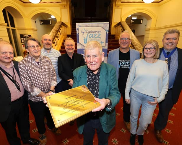 Mike Gordon receives a plaque to commemorate his services to jazz. He is pictured front with sax player Alan Barnes, bassist Bob Walker, drummer Rowan Oliver, vocalist Richard Adams, Mike's son Mark, his daughter Zoe Adams and Scarborough mayor Coun John Ritchie