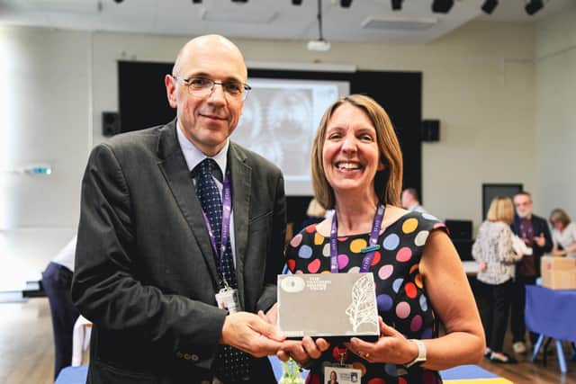 Allan McFarlane (left) with George Pindar School Principal, Lesley Welsh (right)