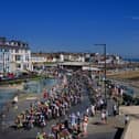 The Tour of Britain raises along Bridlington Seafront. Photo: Richard Ponter