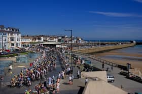 The Tour of Britain raises along Bridlington Seafront. Photo: Richard Ponter