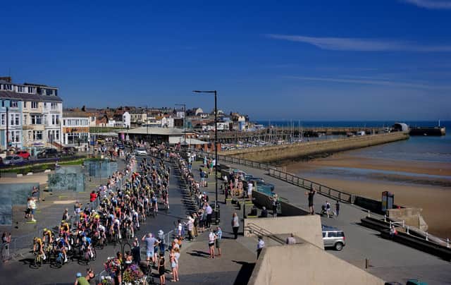 The Tour of Britain raises along Bridlington Seafront. Photo: Richard Ponter