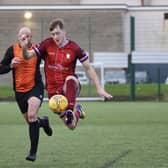 A Pandas player keeps the ball under control.