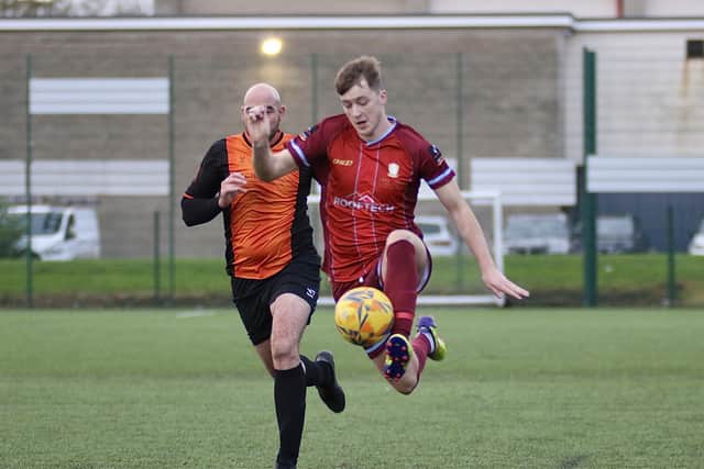 A Pandas player keeps the ball under control.