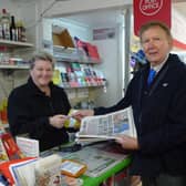 Sir Greg Knight MP buying newspapers at a small shop near Bridlington, served by the store staff Shaaran Moore and Sarah Crowther.