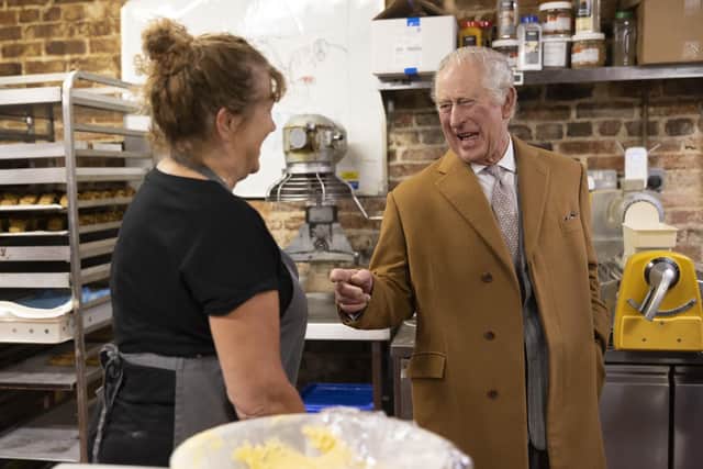 King Charles III during a visit to Talbot Yard Food Court in Yorkersgate, Malton, North Yorkshire to meet food and drink producers with shops and to hear more about their locally produced goods.James Glossop/PA Wire