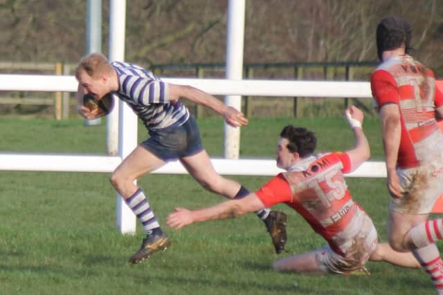 Jed Jackson beats the Wetherby defence to go in for Pocklington's first try. Photo by Phil Gilbank