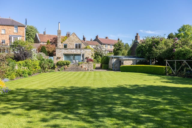 Looking up towards the rear of the property in its village setting.