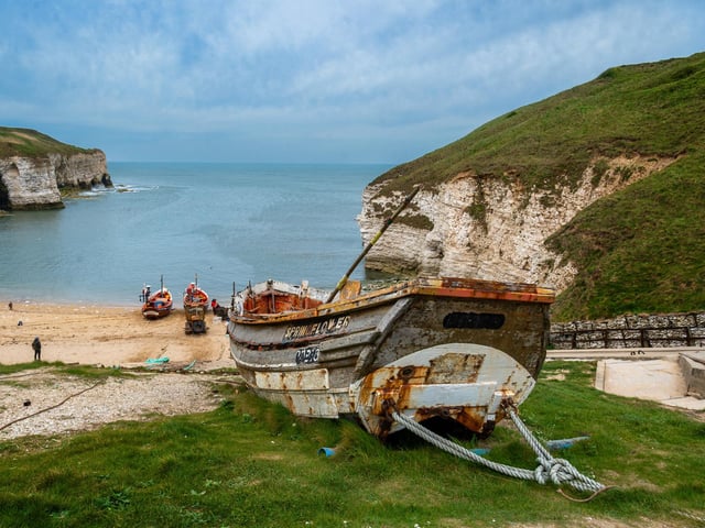 The coastline with its white, rugged cliffs provides great hiking opportunities, looping around windswept paths which prove to be a great spot for bird watching.