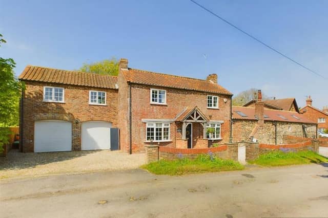 A front view of the village property for sale at £650,000.