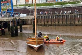 Bridlington RNLI Inshore Lifeboat (ILB) ‘Ernie Wellings’ alongside Bridlington Coble 'Three Brothers'. Photo courtesy of Gail Spowage.