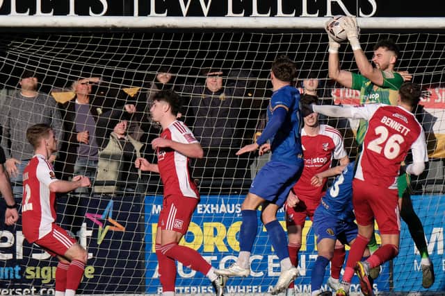 Ryan Whitley collects the ball safely. Photo by Richard Ponter