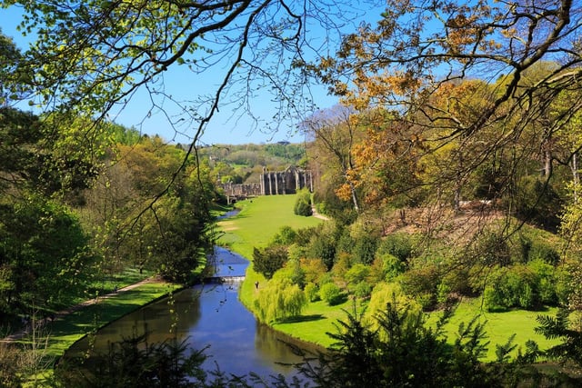 UNESCO World Heritage Site features the ancient atmospheric ruins of Fountains Abbey ruins and a gorgeous water garden with secret statues and glistening ponds.