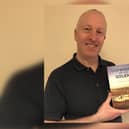 Richard M Jones with his new book Shipwrecks of the Solent.