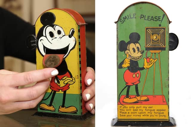 Close-up of Mickey Mouse moneybox.