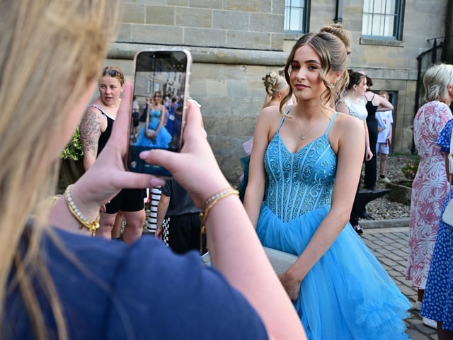 Capturing the special occasion on camera.