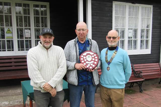 Summer Champion of Champions winner Billy Holdsworth (centre), with runner-up Gary Thornton, left, and Association President Ed McCormack.