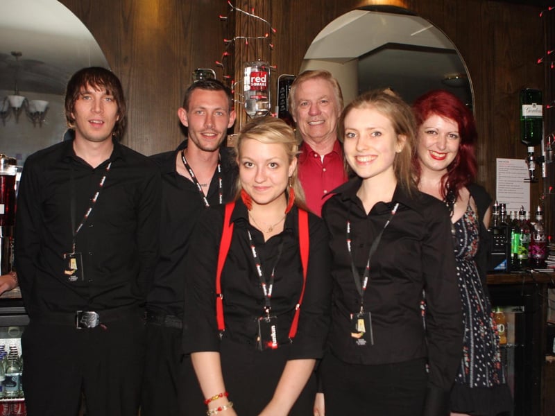 Red Square staff Nils, Tom, Lisa, Rita, Amber and Sadie open the new bar.
132843g