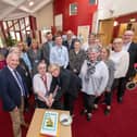 Happy 20th anniversary - North Yorkshire Council’s executive member for health and adult services, Coun Michael Harrison, left, and the corporate director for health and adult services, Richard Webb,  with staff and residents at North Yorkshire’s first Extra Care site, The Orchards, in Brompton, near Northallerton.