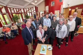 Happy 20th anniversary - North Yorkshire Council’s executive member for health and adult services, Coun Michael Harrison, left, and the corporate director for health and adult services, Richard Webb,  with staff and residents at North Yorkshire’s first Extra Care site, The Orchards, in Brompton, near Northallerton.