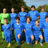 Heslerton Under 14's in their kit supplied by Terry Elsey Tyres of Malton.