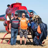 George Mattinson (center), together with Instructor Alec Flint (right) and Alan Ramsden of Tiger Helicopters (left). Photo: David Ruston