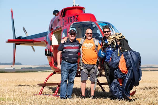 George Mattinson (center), together with Instructor Alec Flint (right) and Alan Ramsden of Tiger Helicopters (left). Photo: David Ruston