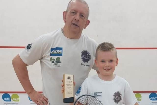 Scarborough Squash Academy star Josh Mowat shows off his Yorkshire U11 Championship trophy.