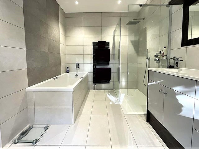 There are three stylish bathrooms in the house.