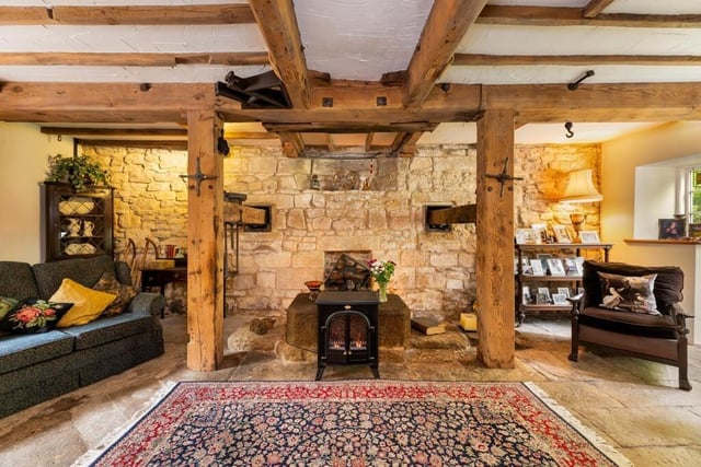Beams, trusses and exposed stone in the 'stone room'