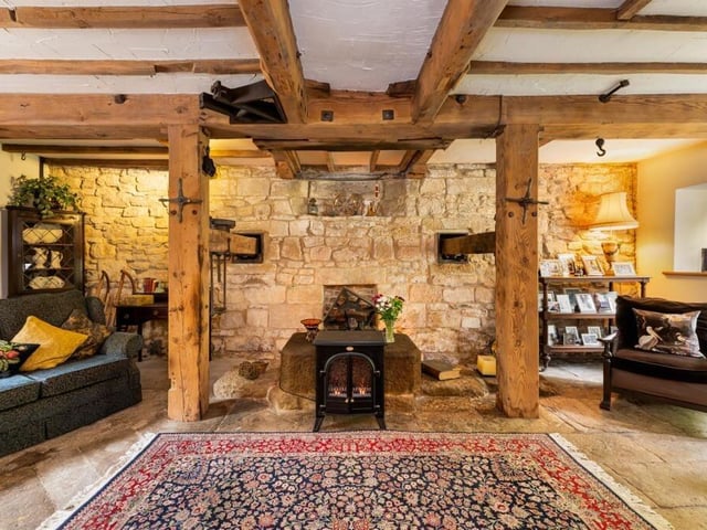 Beams, trusses and exposed stone in the 'stone room'